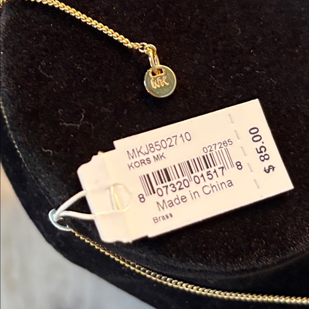 Michael KORS Gold Tone Logo Charm Pendant Necklace - Picture 9 of 9